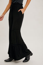 Load image into Gallery viewer, Bluivy Solid Color Tiered Palazzo Pants in Black
