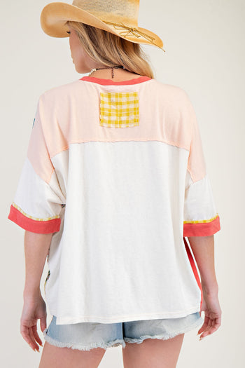 Easel Color Block Mixed Prints Top with Large Flower Patch Front in Peach Red