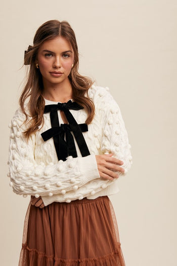 Listicle Open Front Cable Knit Cardigan with Contrasting Color Bow Tie Front in Cream