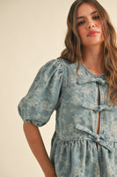 Miou Muse Floral Jacquard Open Front Bow Tie Top in Denim