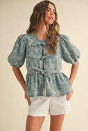 Miou Muse Floral Jacquard Open Front Bow Tie Top in Denim