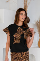 TRENDiLiTY French Terry Top with Leopard Bow and Flutter Sleeves in Black