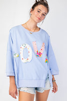 Easel OVERSIZED Top with Mixed Print LOVE Letter Patch Front in Peri Blue