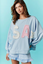 Load image into Gallery viewer, Fantastic Fawn OVERSIZED French Terry Top with USA Patch and Pearl Embellishments in Blue
