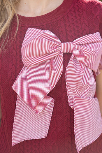 VOY Cable Knit Top with Striped Cuffs and Large Bow Front in Red