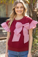 VOY Cable Knit Top with Striped Cuffs and Large Bow Front in Red