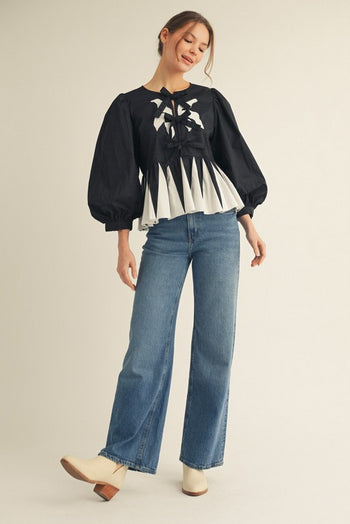 Jodifl Contrasting Bow Detail Peplum Top in Black/White