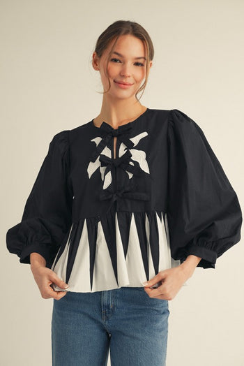 Jodifl Contrasting Bow Detail Peplum Top in Black/White