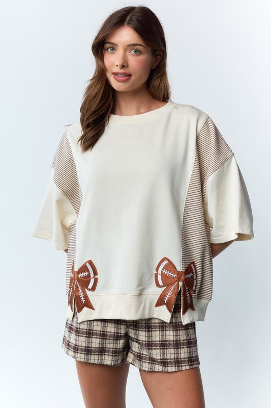 RARERAW Solid and Stripe Top with Embroidered Football Bow Patches in Ivory