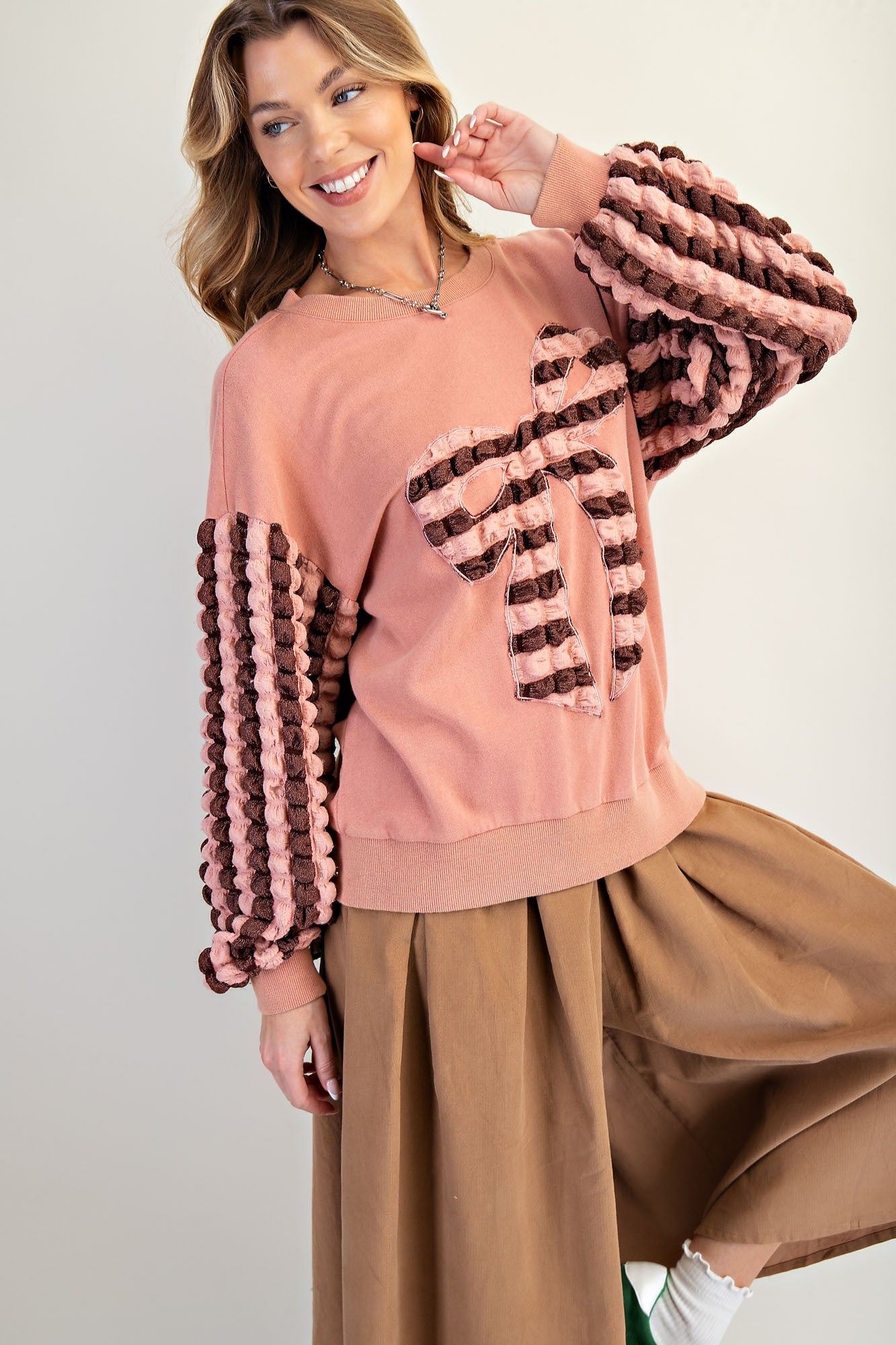 Easel Terry Knit Top with Striped Puff Sleeves and Front Bow Patch