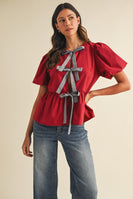 AnnieWear Solid Color Open Front Peplum Top with Contrasting Color Bow Tie Front in Crimson/Grey