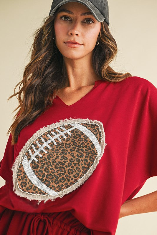 AnnieWear Solid Color Top with Leopard Football Patch Front in Crimson