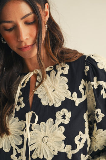 LovLov Contrasting Color 3D Flower Peplum Top in Black/White