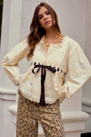 LovLov Solid Color Top with Contrasting Bow and Lace Details in Ivory/Black ON ORDER