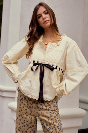 LovLov Solid Color Top with Contrasting Bow and Lace Details in Ivory/Black ON ORDER