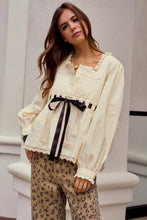 Load image into Gallery viewer, LovLov Solid Color Top with Contrasting Bow and Lace Details in Ivory/Black ON ORDER
