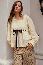 Load image into Gallery viewer, LovLov Solid Color Top with Contrasting Bow and Lace Details in Ivory/Black ON ORDER
