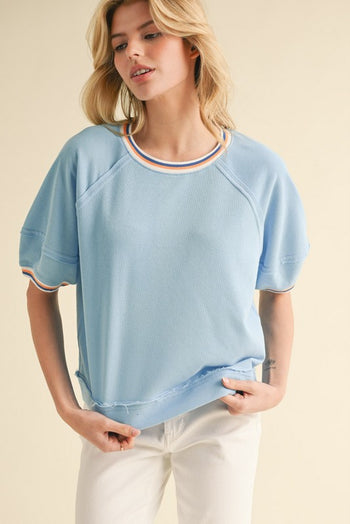 Jodifl Solid Color Knit Top with Contrasting Colored Stripes Details in Blue