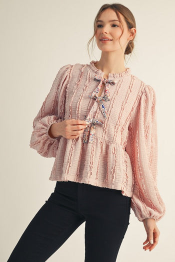 Jodifl Textured Bow Tie Front Peplum Top in Blush