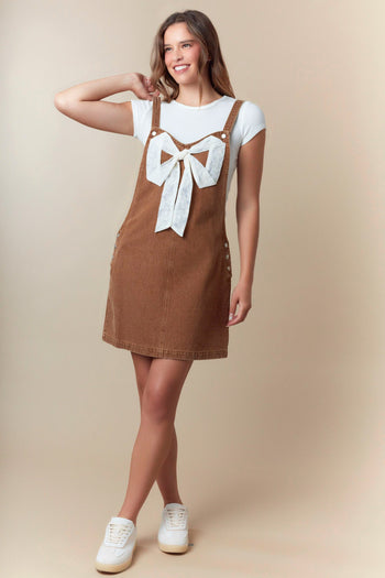 Fantastic Fawn Overall Mini Dress with Ribbon Bow Front in Camel S Fantastic Fawn Overall Mini Dress with Ribbon Bow Front in Camel S