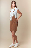 Fantastic Fawn Overall Mini Dress with Ribbon Bow Front in Camel