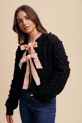 Listicle Open Front Cable Knit Cardigan with Contrasting Color Bow Tie Front in Black
