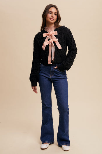 Listicle Open Front Cable Knit Cardigan with Contrasting Color Bow Tie Front in Black