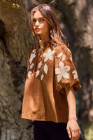 Oddi Washed Suede Top with Contrasting Floral Appliques in Camel