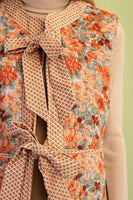 GiGio Contrasting Floral Print Quilted Vest in Burnt Orange