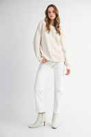 MABLE Soft Knit Open Back Sweater with Stitched Organza Bow Closure in Oatmeal