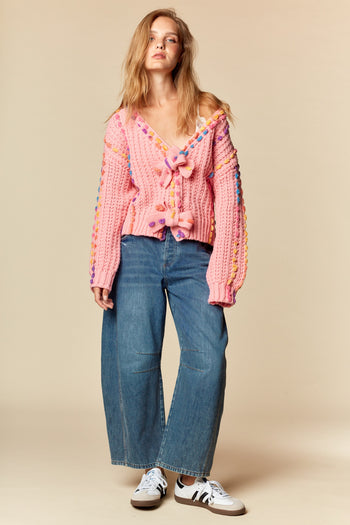 RARERAW Pom-Pom Knit Cardigan With Rainbow Bow Accents in Candy Pink