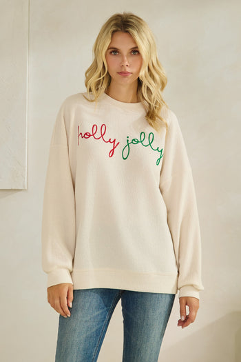 Tres Bien Solid Color Cloudy Knit Top with HOLLY JOLLY Graphic Print Front in Cream