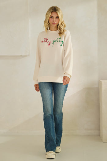 Tres Bien Solid Color Cloudy Knit Top with HOLLY JOLLY Graphic Print Front in Cream