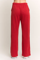HEIMISH Textured Knit Pants in Red