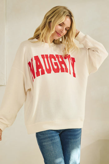 Tres Bien Solid Color Cloudy Knit Top with NAUGHTY Graphic Print Front in Cream