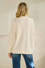 Load image into Gallery viewer, Tres Bien Solid Color Cloudy Knit Top with NICE Graphic Print Front in Cream
