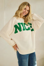 Load image into Gallery viewer, Tres Bien Solid Color Cloudy Knit Top with NICE Graphic Print Front in Cream
