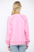 FATE Solid Color Sweatshirt with Contrasting Color Piping Detail in Bubblegum Pink