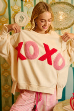 Load image into Gallery viewer, BiBi OVERSIZED French Terry Top with "XOXO" Letter Patches in Ivory
