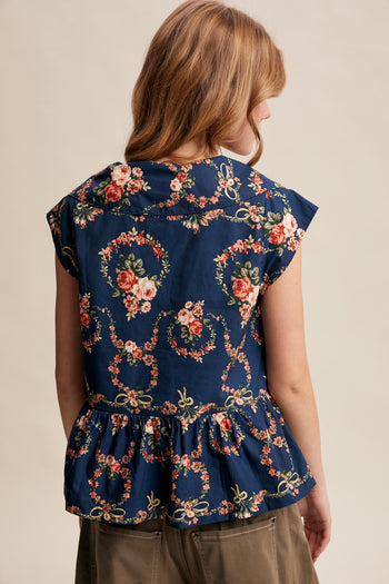 Listicle Floral Peplum Tie-Front Top in Navy