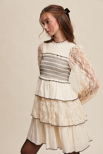 Listicle Lace Tired Mini Dress with Contrasting Stitching in Cream