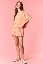 Load image into Gallery viewer, Peach Love Garment Dyed Slub Jersey Crop Top And Skort Set Orange

