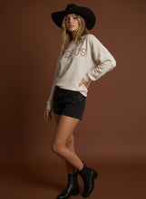 Load image into Gallery viewer, Tres Bien Solid Color Cloudy Knit Top with JESUS Graphic Print Front in Cream
