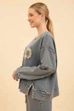 Load image into Gallery viewer, Heimish Eyelet Bow Applique Raw Edge Sweatshirt in Light Denim
