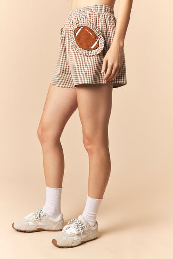 Peach Love Gingham Ruffled Football Patched Pocket Shorts in Brown