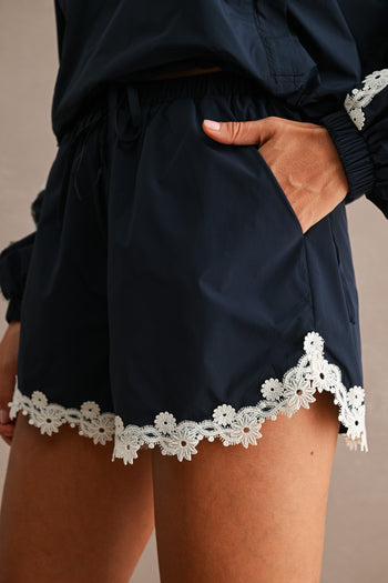 MABLE Hood Half Zip-up Lace Trim Windbreaker Jacket And Shorts Set in Navy