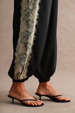 Load image into Gallery viewer, MABLE Satin Balloon Pants With Lace Trim in Black
