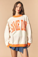 Peach Love Reversible Gameday And Stripe Mock Neck Sweatshirt in Burnt Orange/Cream