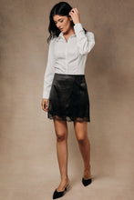 Load image into Gallery viewer, Sunday Edition High Waisted Satin Surplice Lace Trim Mini Skirt in Black
