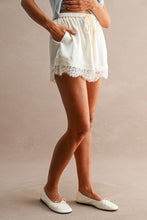 Load image into Gallery viewer, MABLE Floral Lace Trim Drawstring Waist Shorts  in Cream
